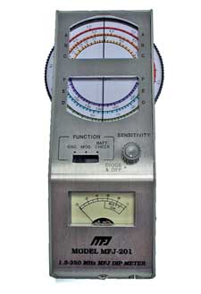A typical analogue grid dip oscillator GDO / dip meter showng the main controls including the large tuning dial