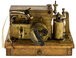 An image of a Morse telegraph inker machine used for marking telegraph characters directly onto paper