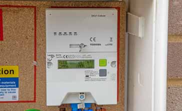 Typical domestic smart meter installation showing the meter section itself along with the communications block